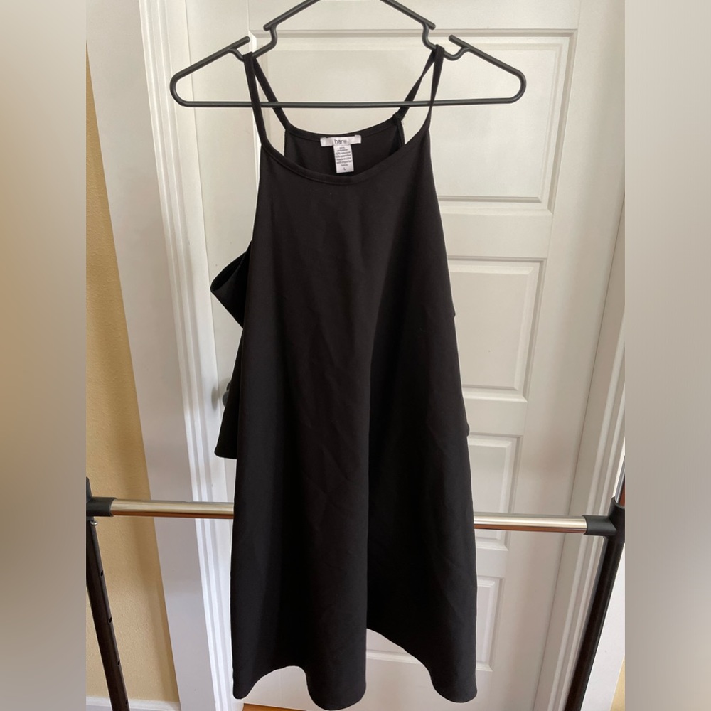 Black cold shoulder dress.